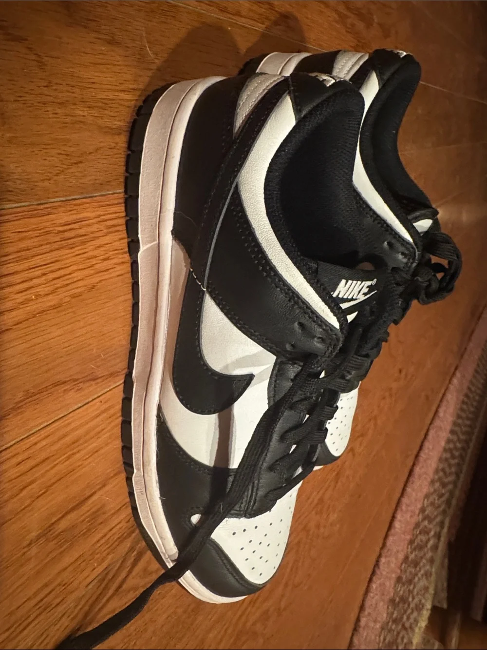 Nike Women’s Black and White Low-Top Sneakers with Swoosh